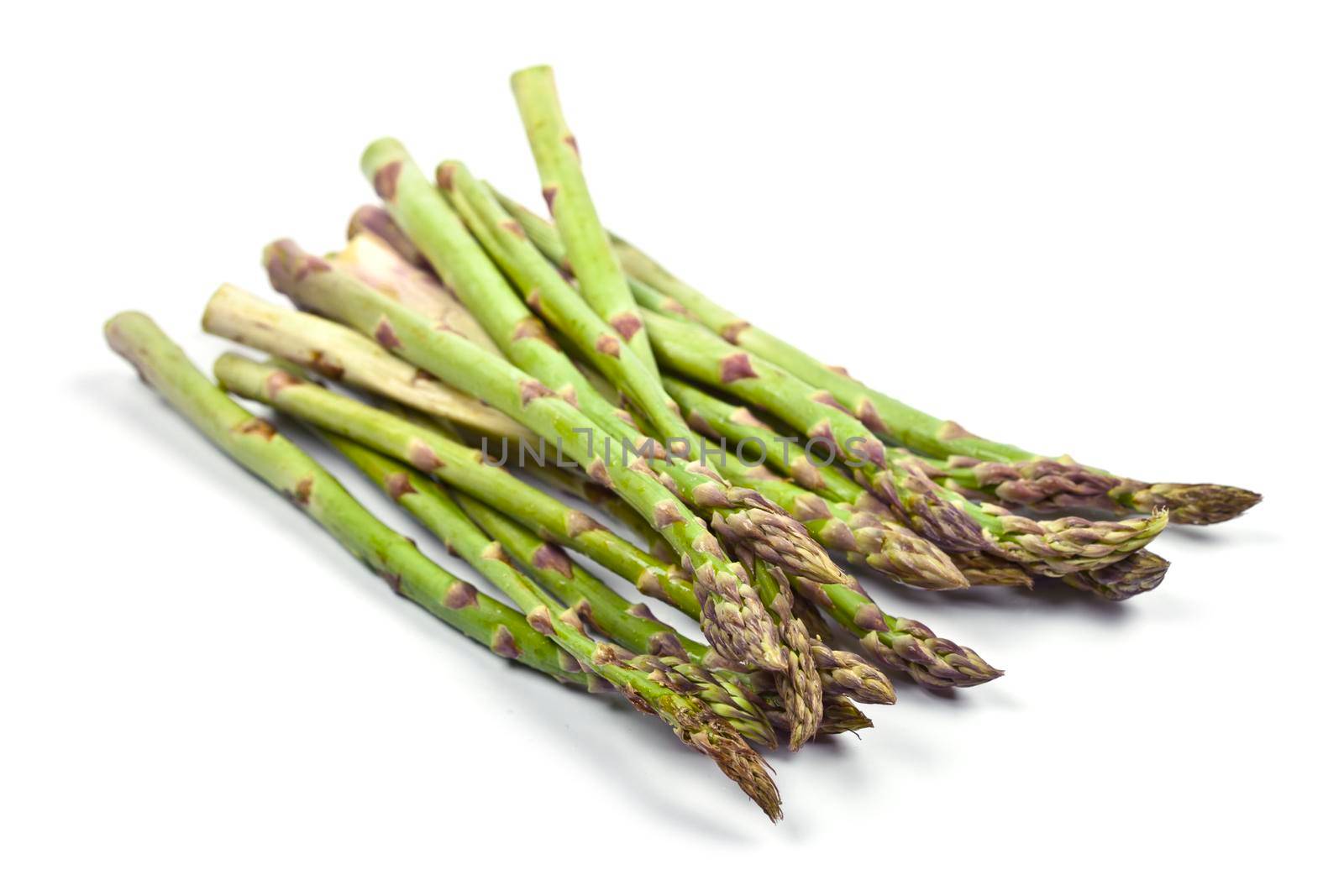 Bunch of fresh raw garden asparagus isolated on white background. Green spring vegetables.  by marylooo