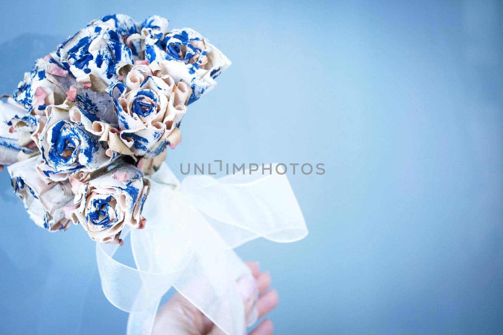 Bridal bouquet made with paper. Blue and beige color. No people