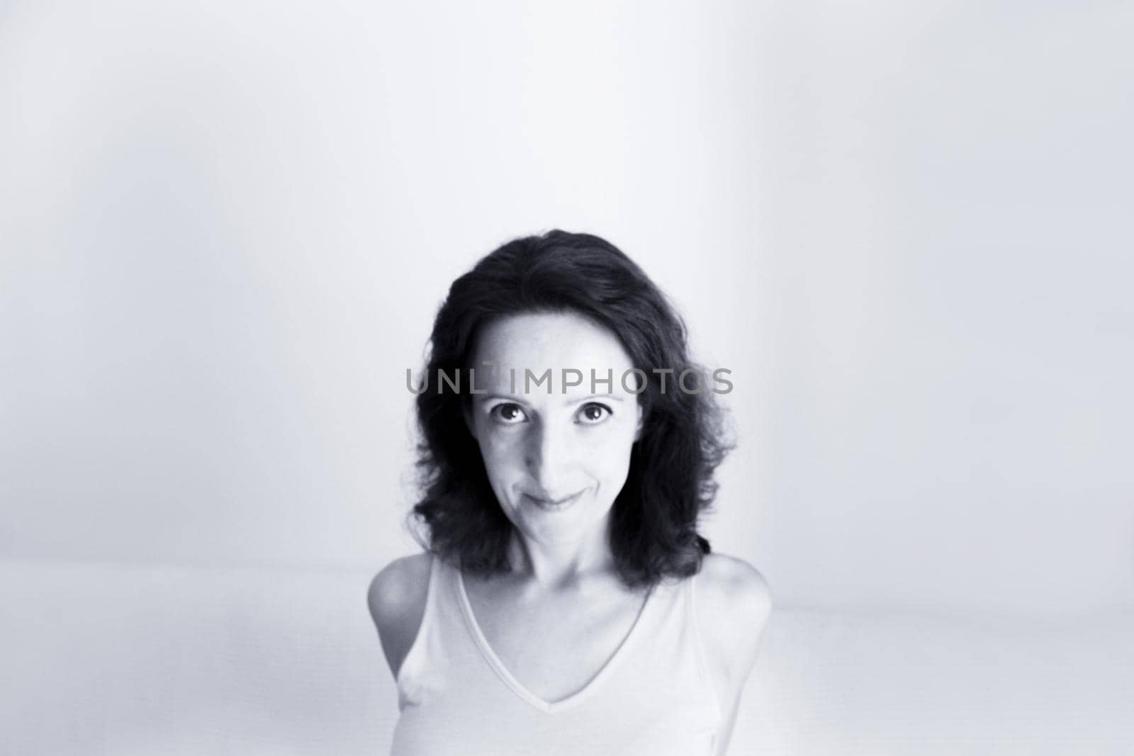 Portrait of woman with happy and positive expression. Copy space.