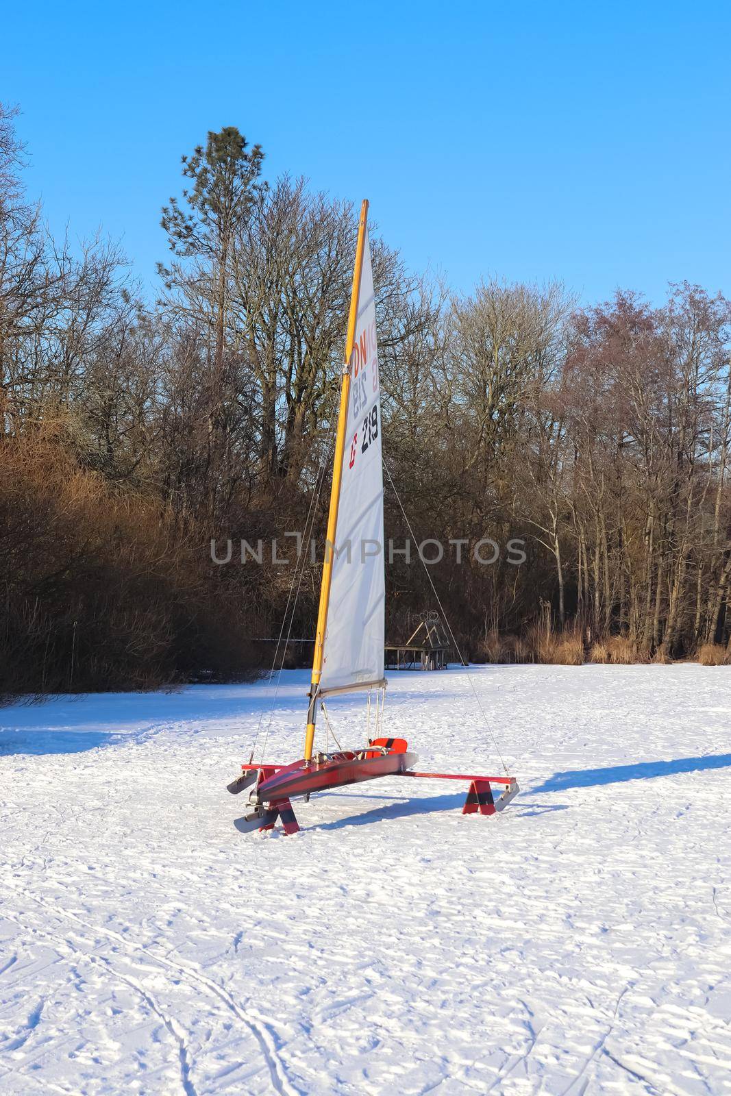 Iceboat runner ready for a ride  on a frozen lake