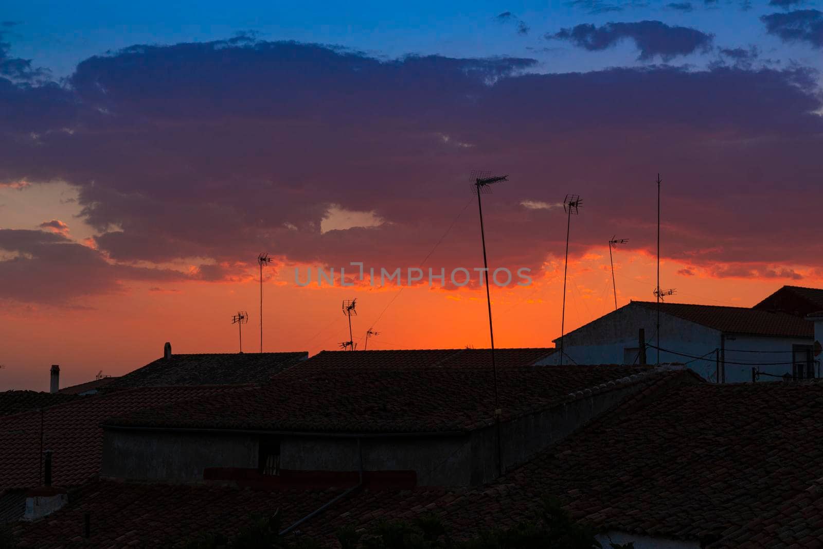 Sunset in a town in southern Andalusia, with beautiful shades of orange and blue