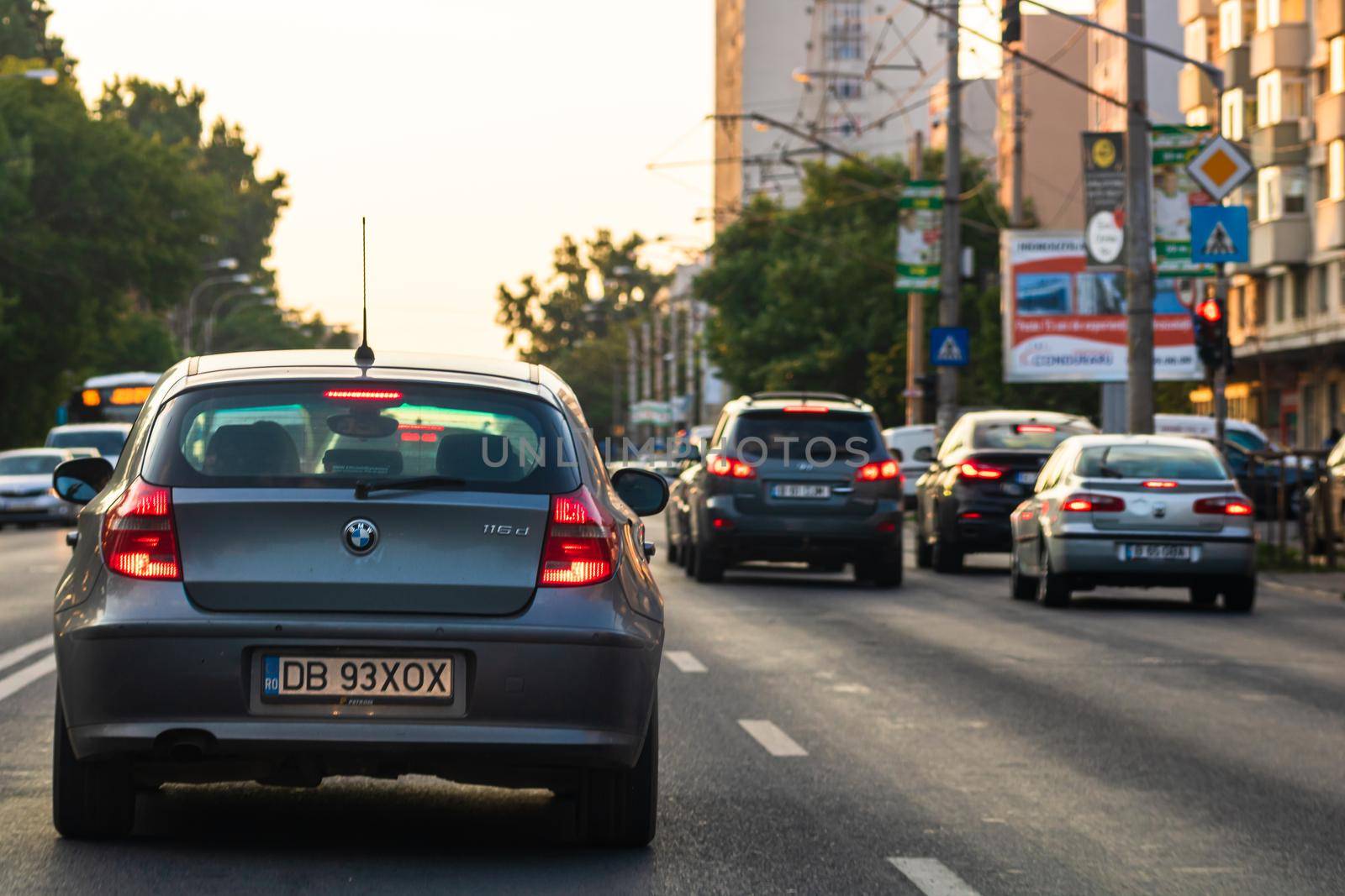 Car traffic at rush hour in downtown area of the city. Car pollution, traffic jam in the morning and evening in the capital city of Bucharest, Romania, 2021
