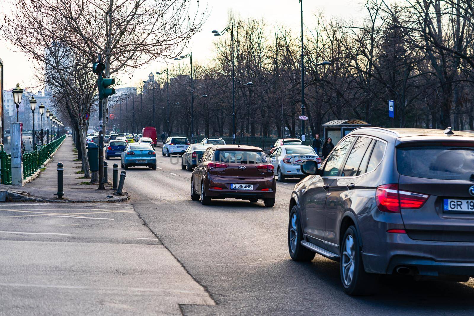 Car traffic at rush hour in downtown area of the city. Car pollution, traffic jam in the morning and evening in the capital city of Bucharest, Romania, 2020 by vladispas