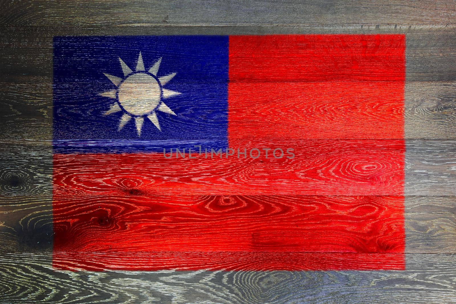 A Taiwan flag on rustic old wood surface background
