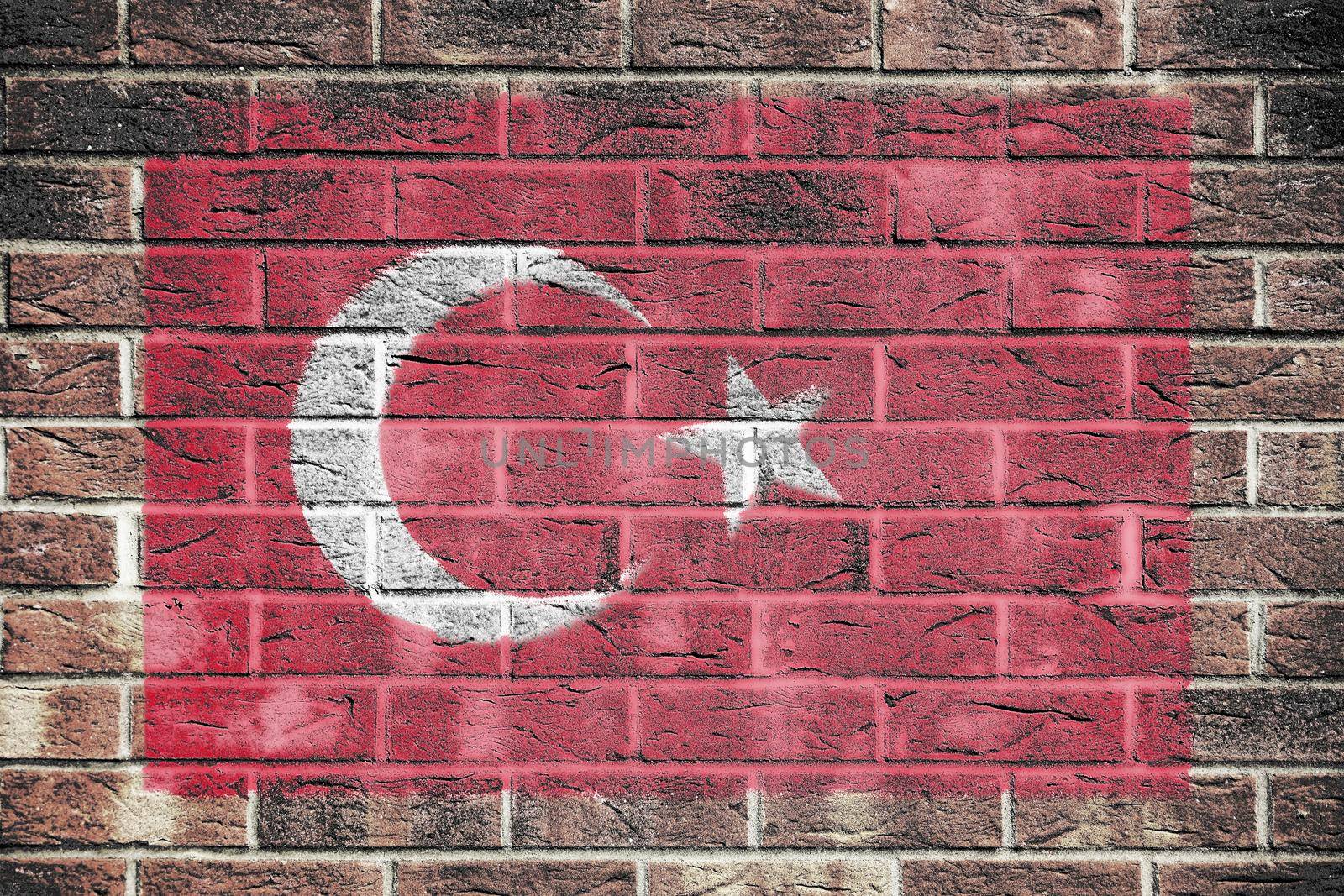 A Turkey flag on a brick wall background