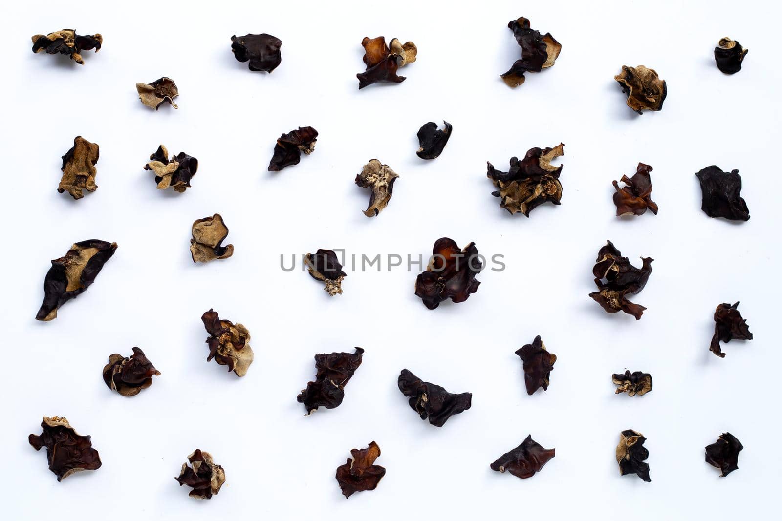 Dried black fungus on white background. Top view