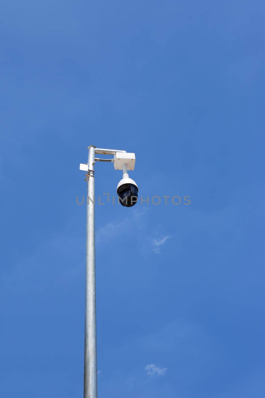 CCTV Camera security  on blue sky by Bowonpat