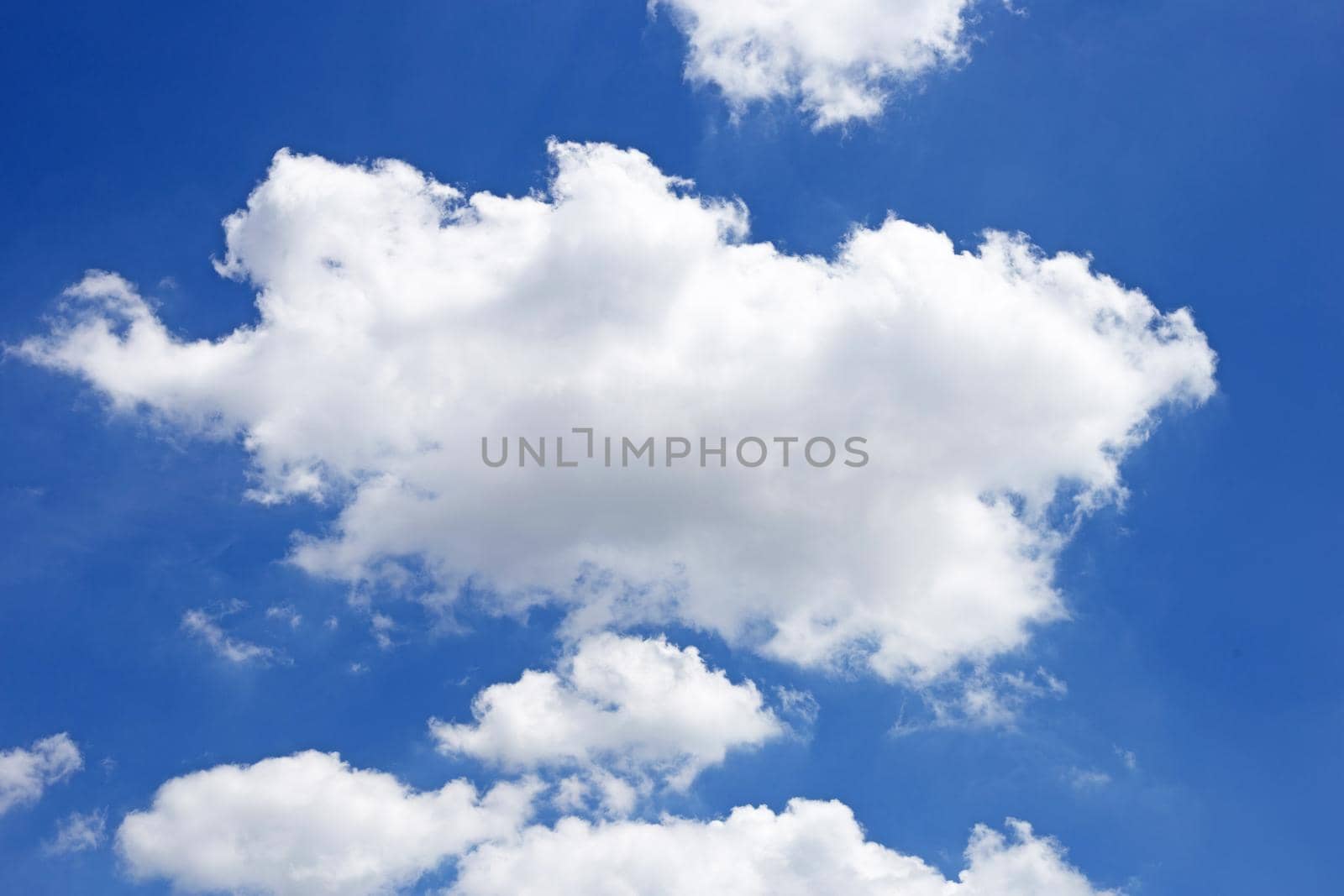 Blue sky background with cloud. Copy space