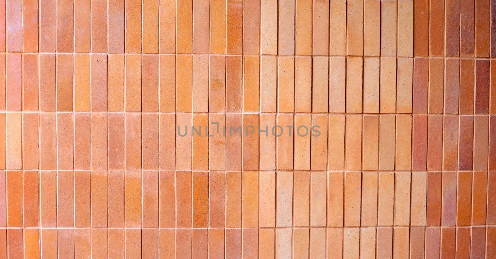 Yellow brown brick wall for background.