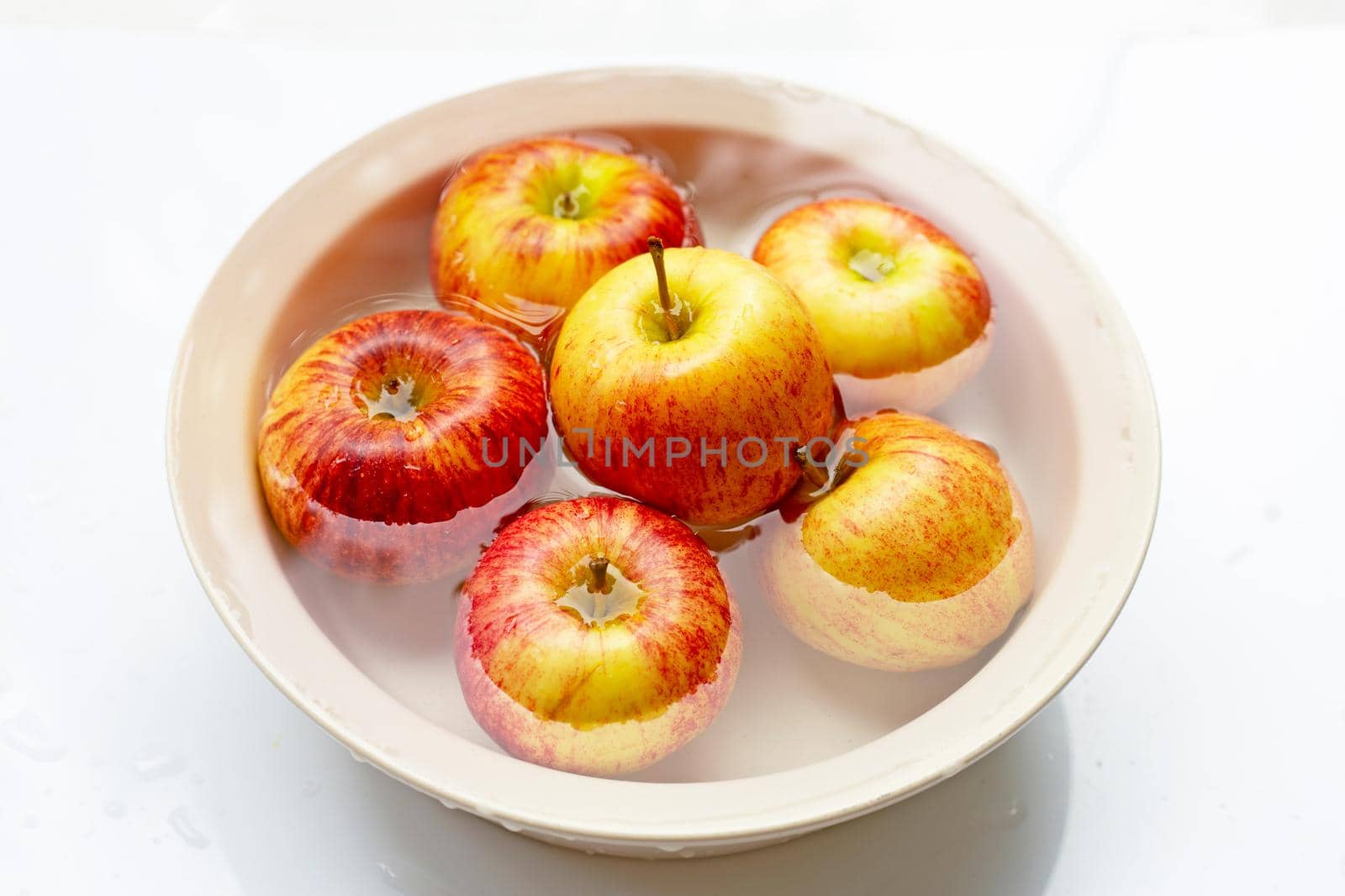 Washing fresh apples in the water
