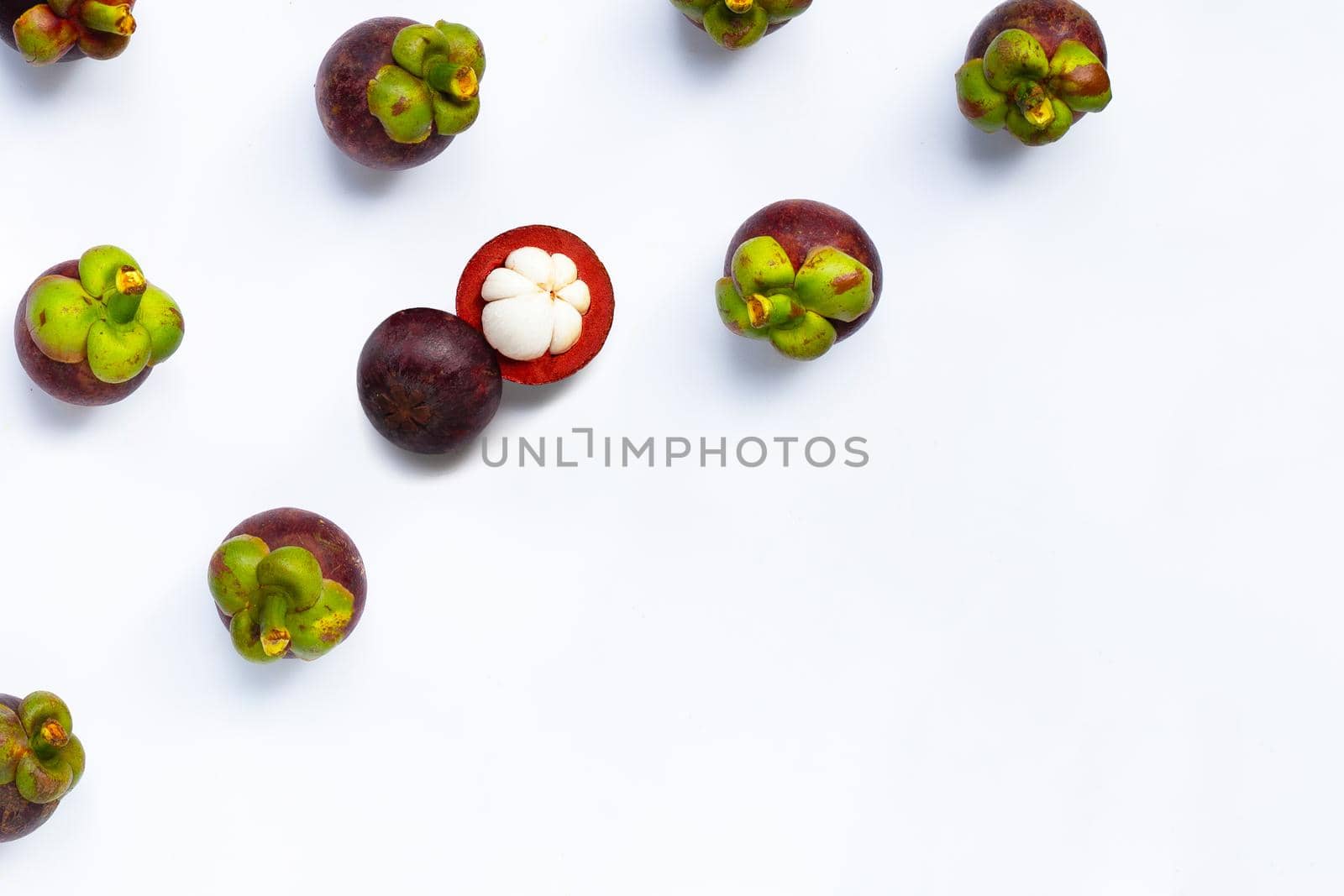 Mangosteen on white background. Top view