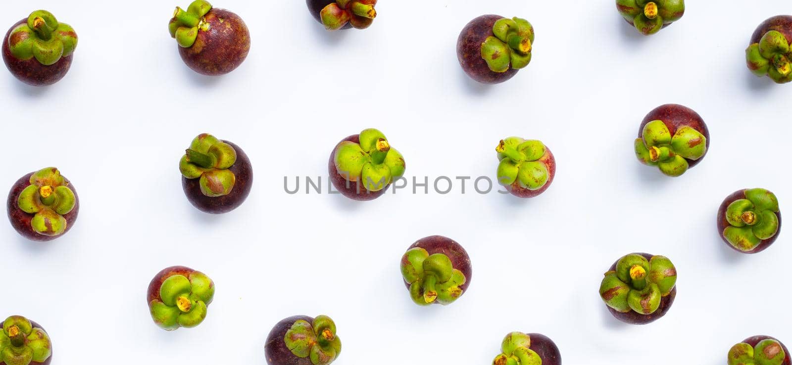 Mangosteen on white background. Top view