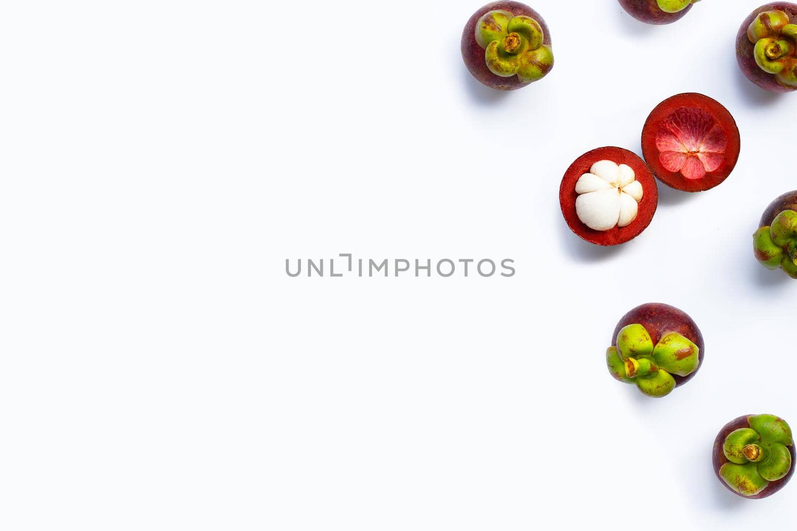 Mangosteen on white background. Top view