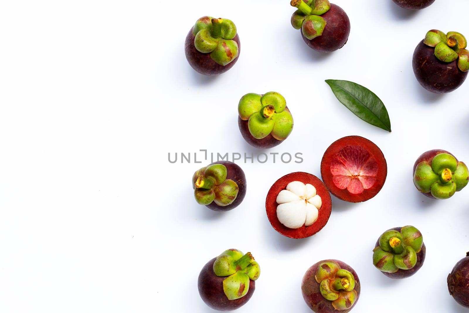 Mangosteen on white background. Top view