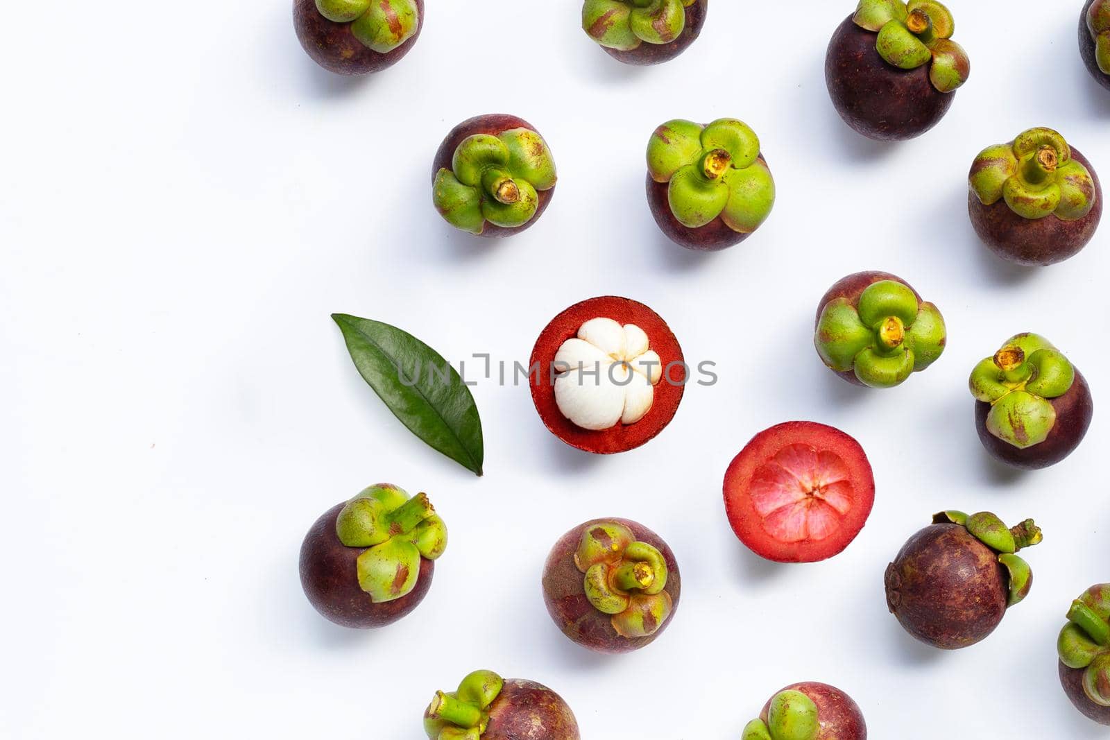 Mangosteen on white background. Top view