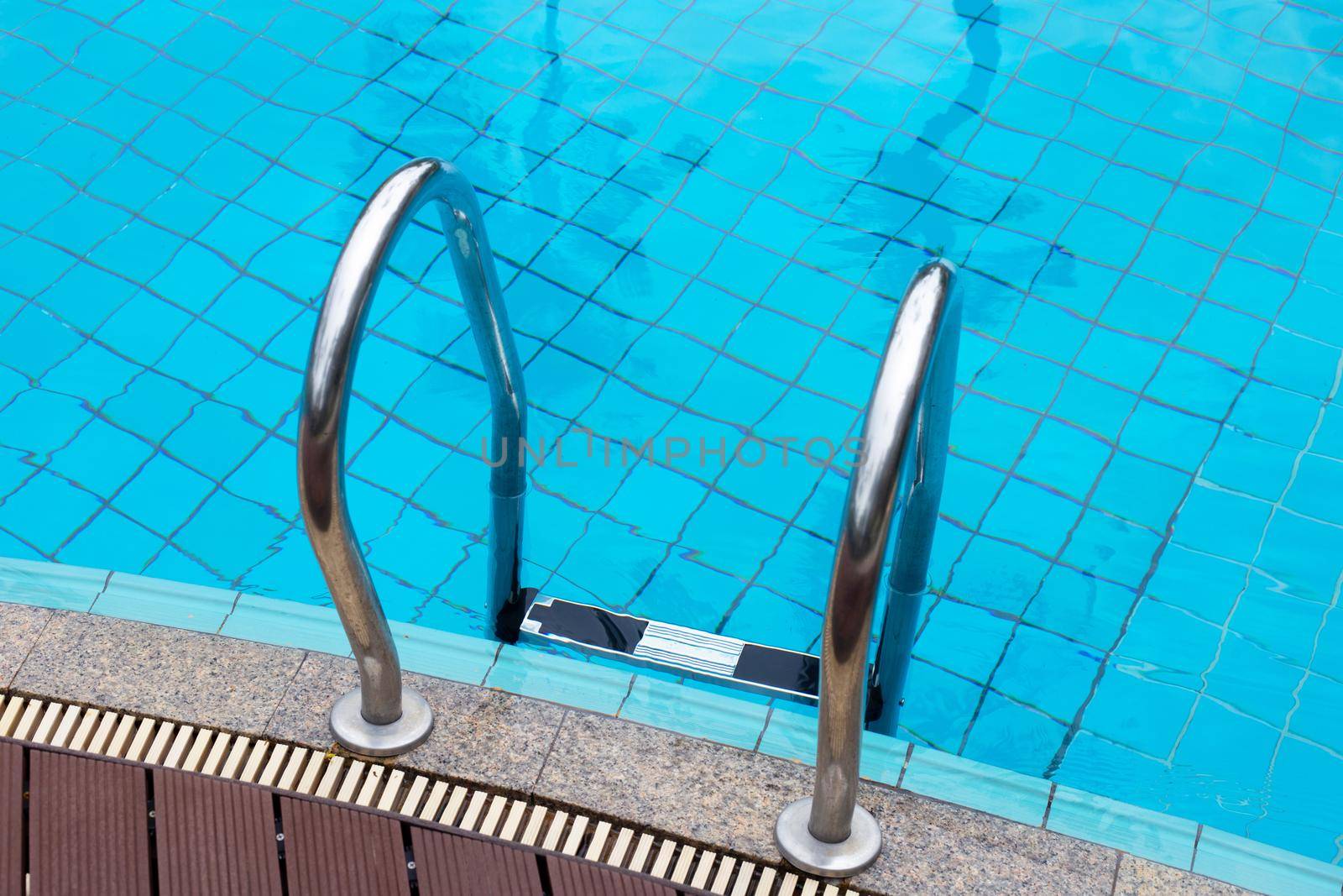 Outdoor swimming pool with stair