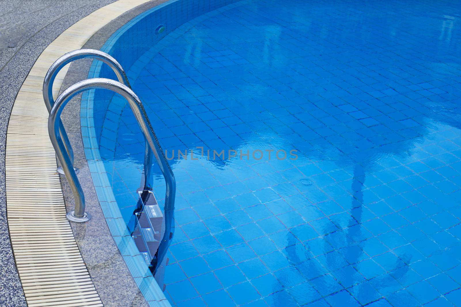 Outdoor swimming pool with stair