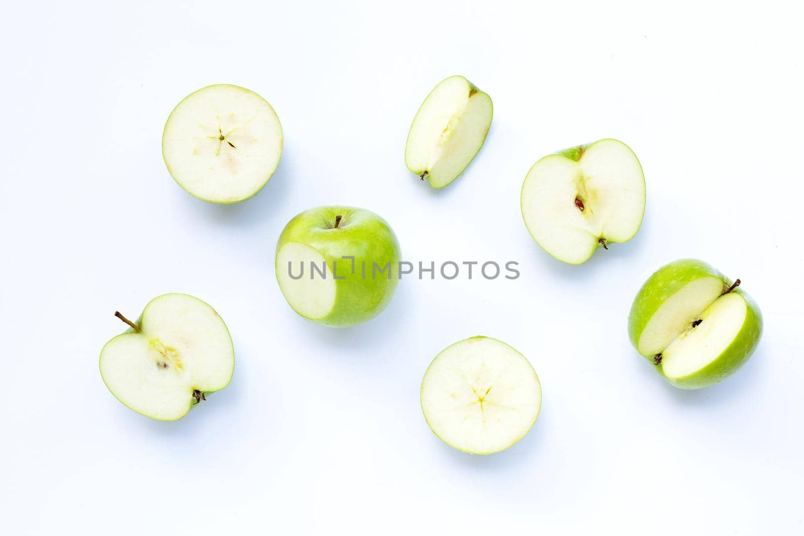 Green apples on white background. Copy space
