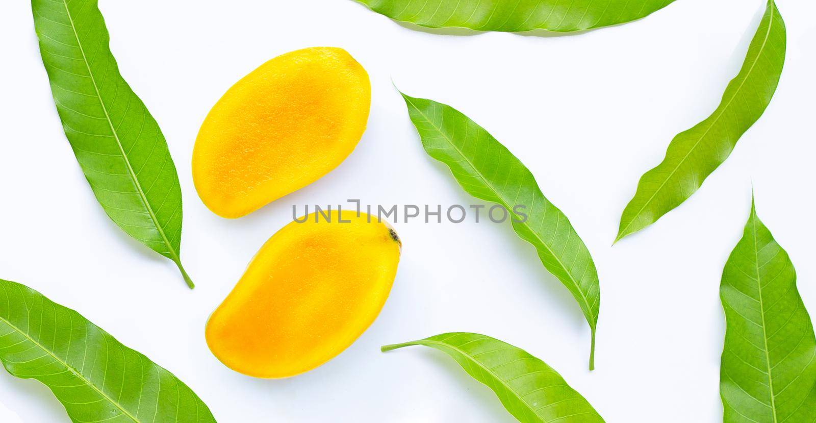 Tropical fruit, Mango  with leaves on white background. Top view