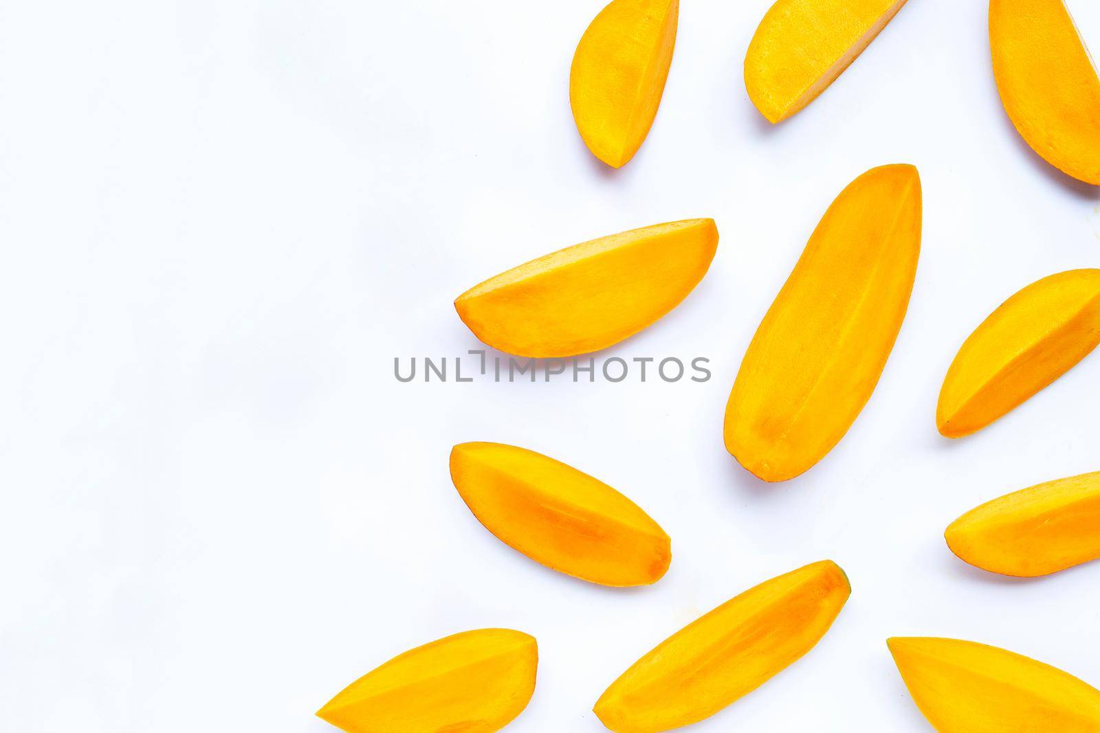 Tropical fruit, Mango  slices on white background. Top view