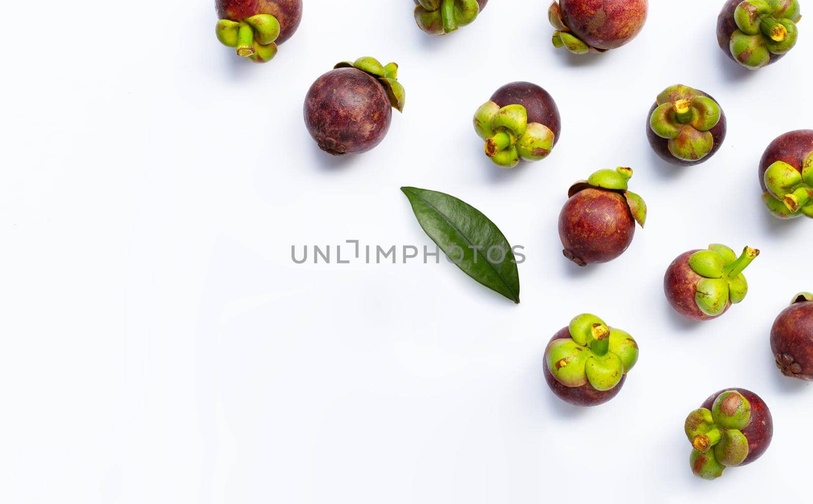 Mangosteen on white background. Top view