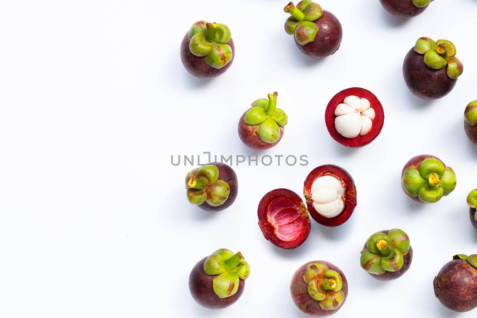 Mangosteen on white background. Top view