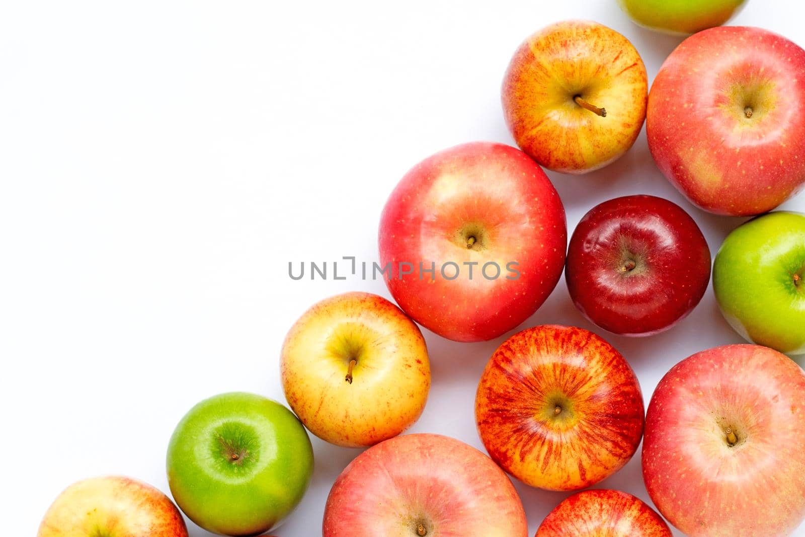 Ripe apples on white background. Copy space