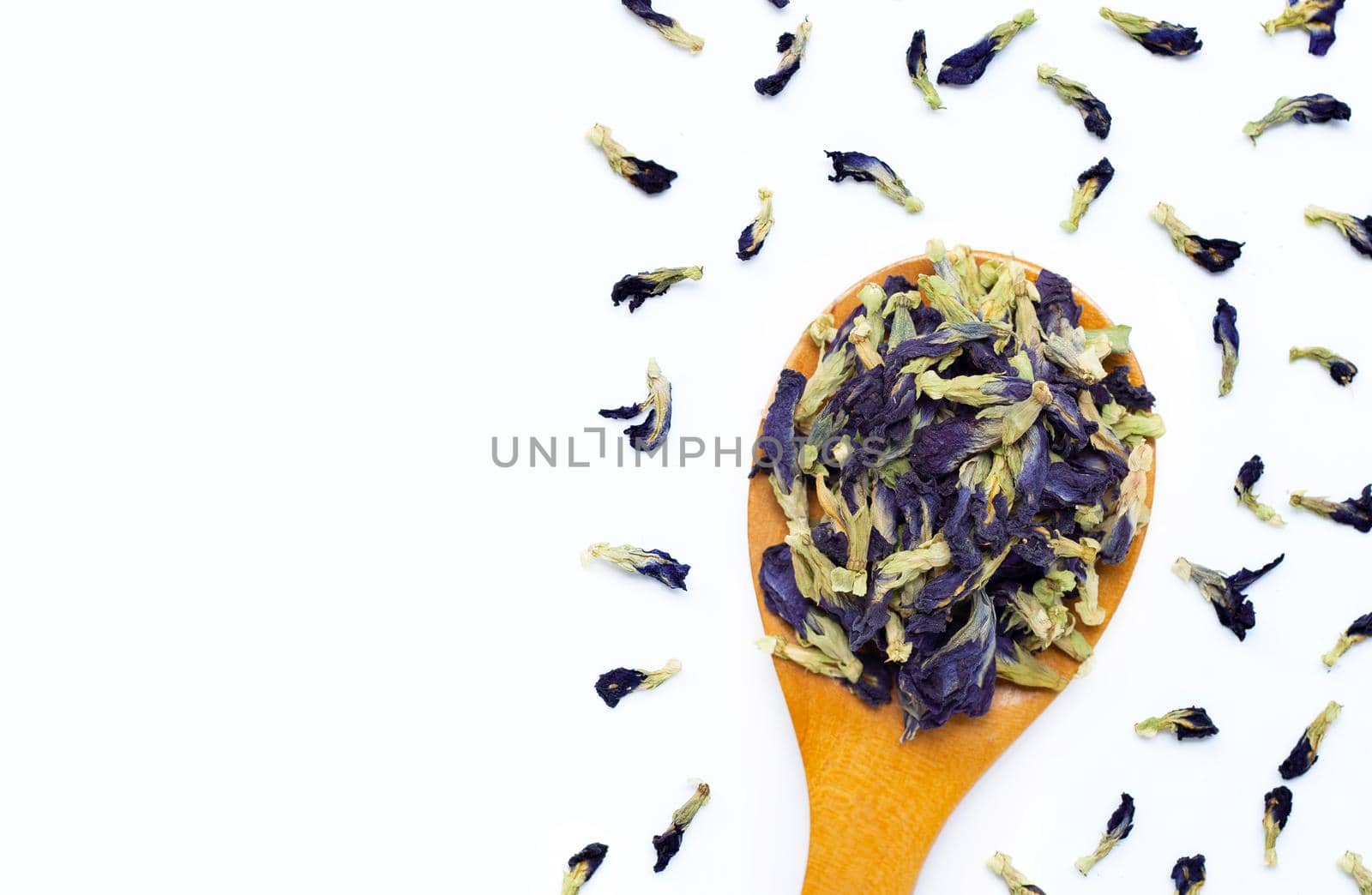 Sun dried butterfly pea on white background. Top view