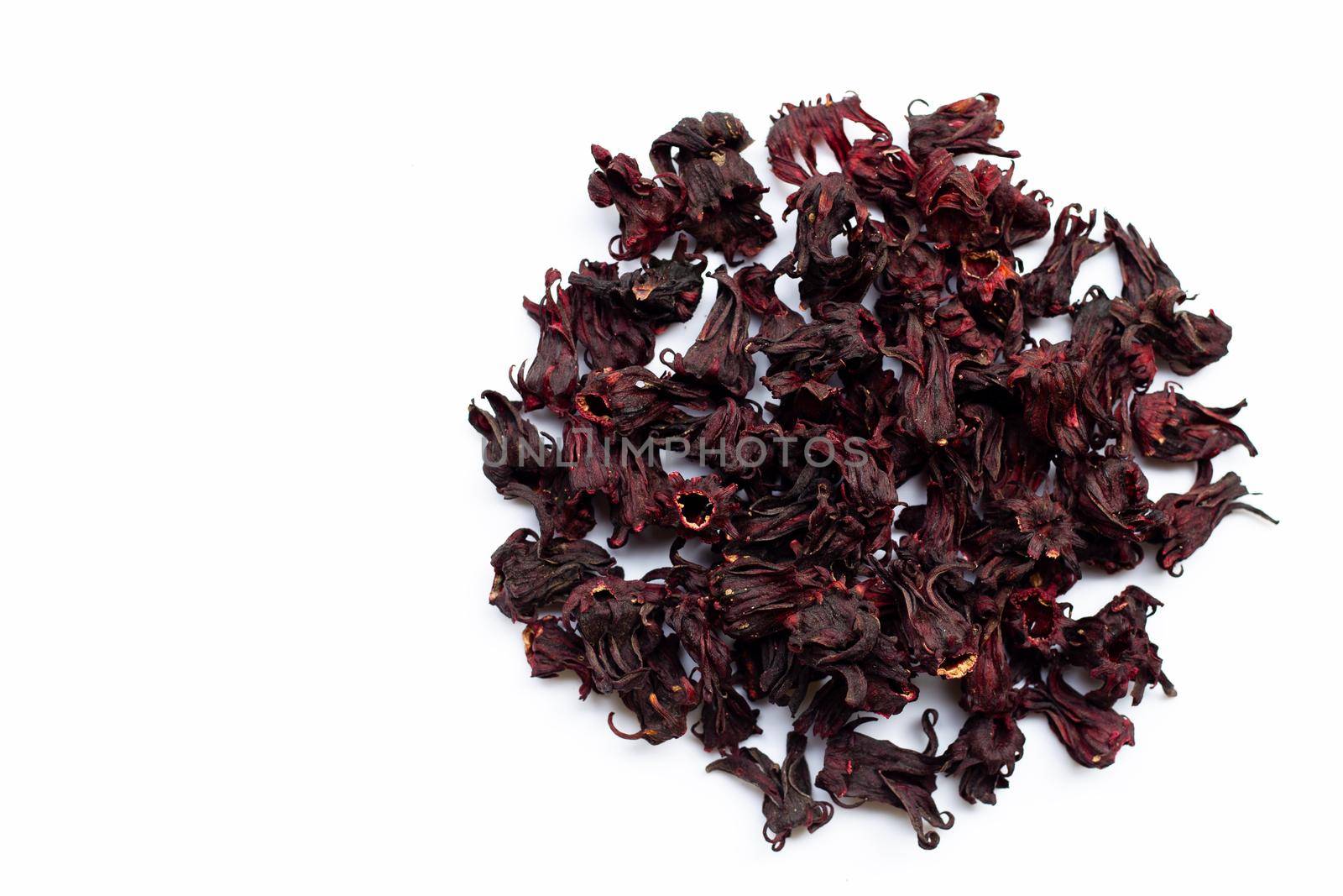 Heap of dried roselle flower isolated on white background. Top view
