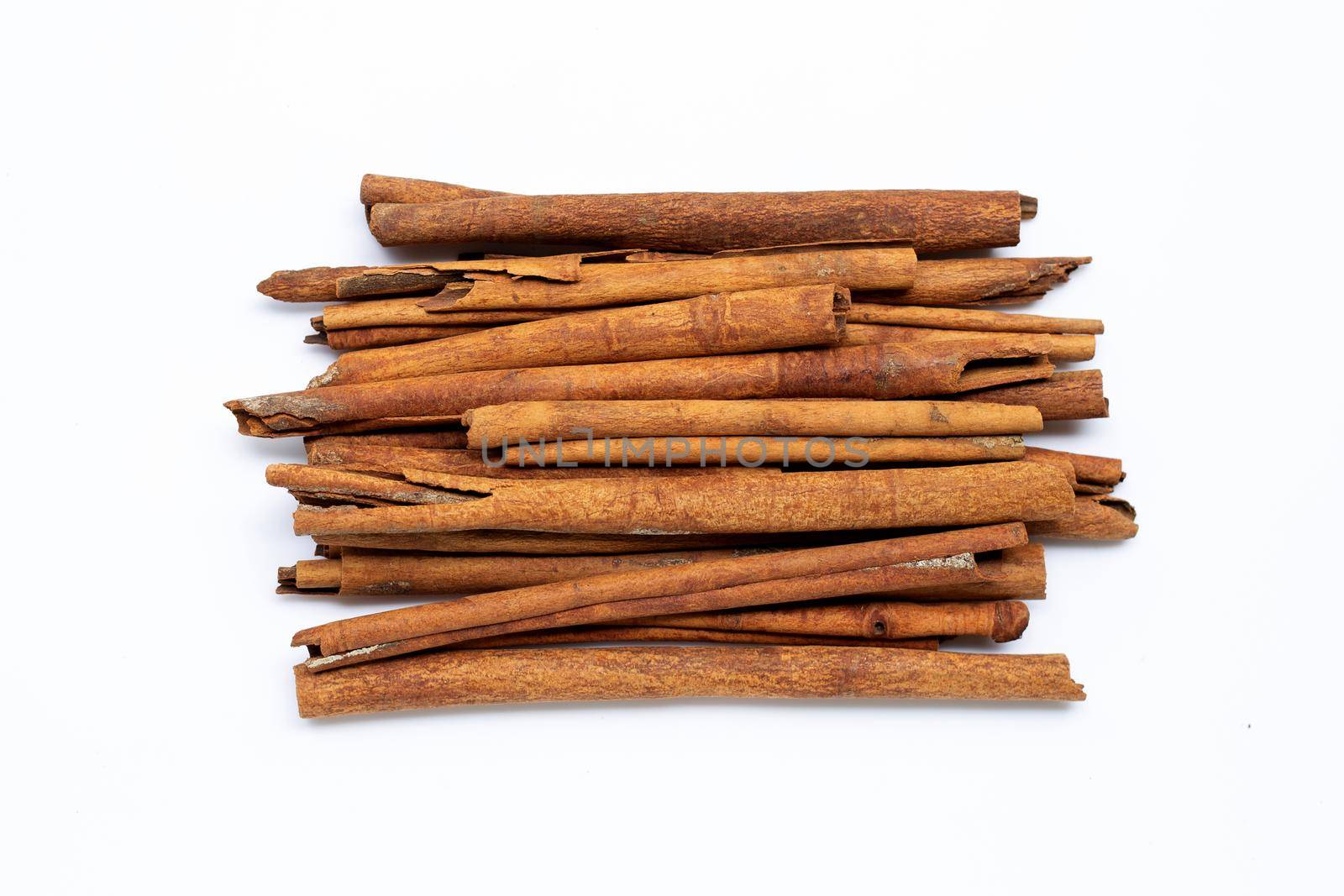 Cinnamon sticks on white background. Top view