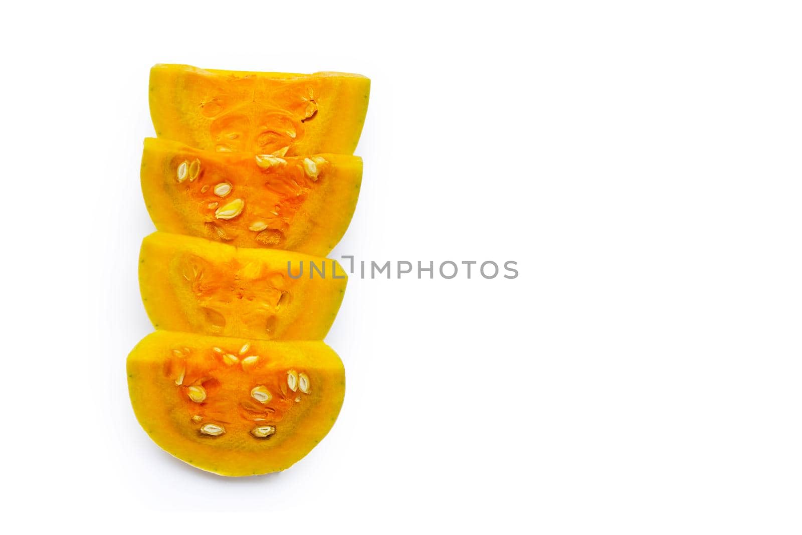 Cut and slices butternut squash on white background.
