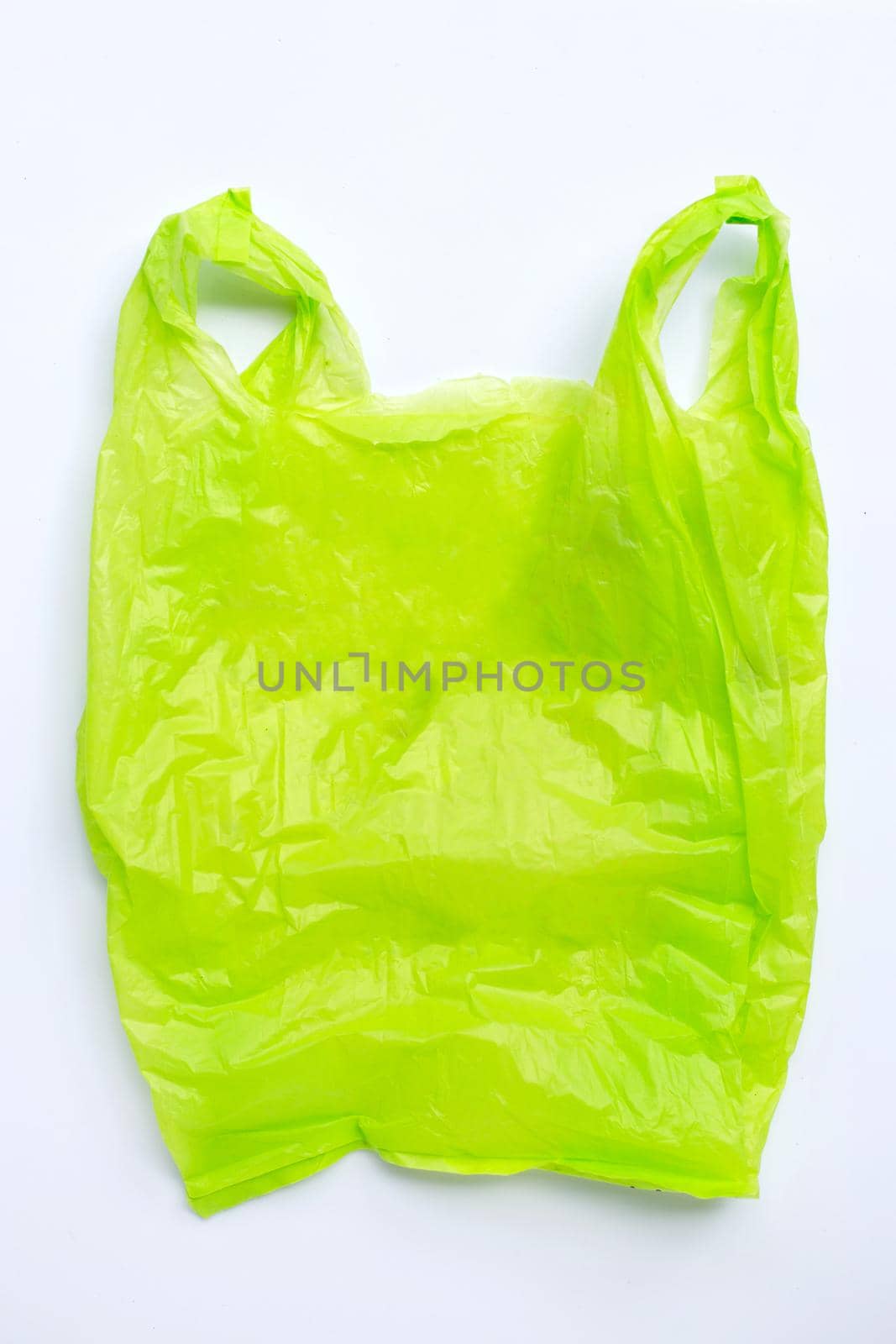 Colorful plastic bags on white background. Copy space