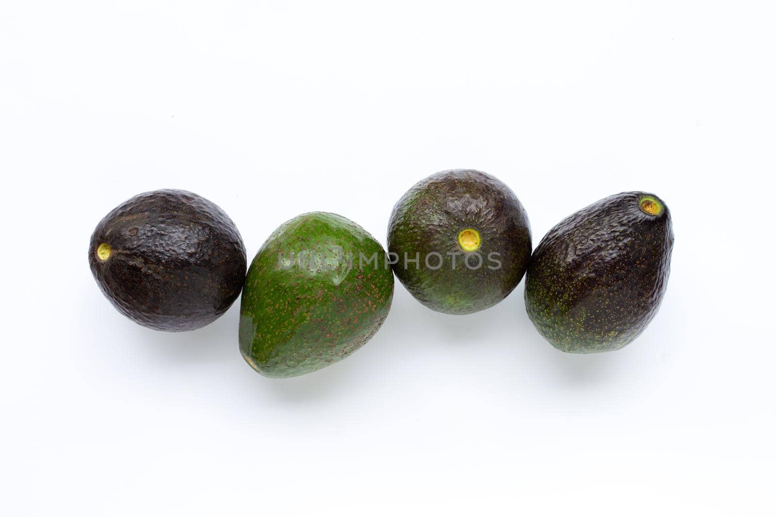 Avocado on white background. Top view