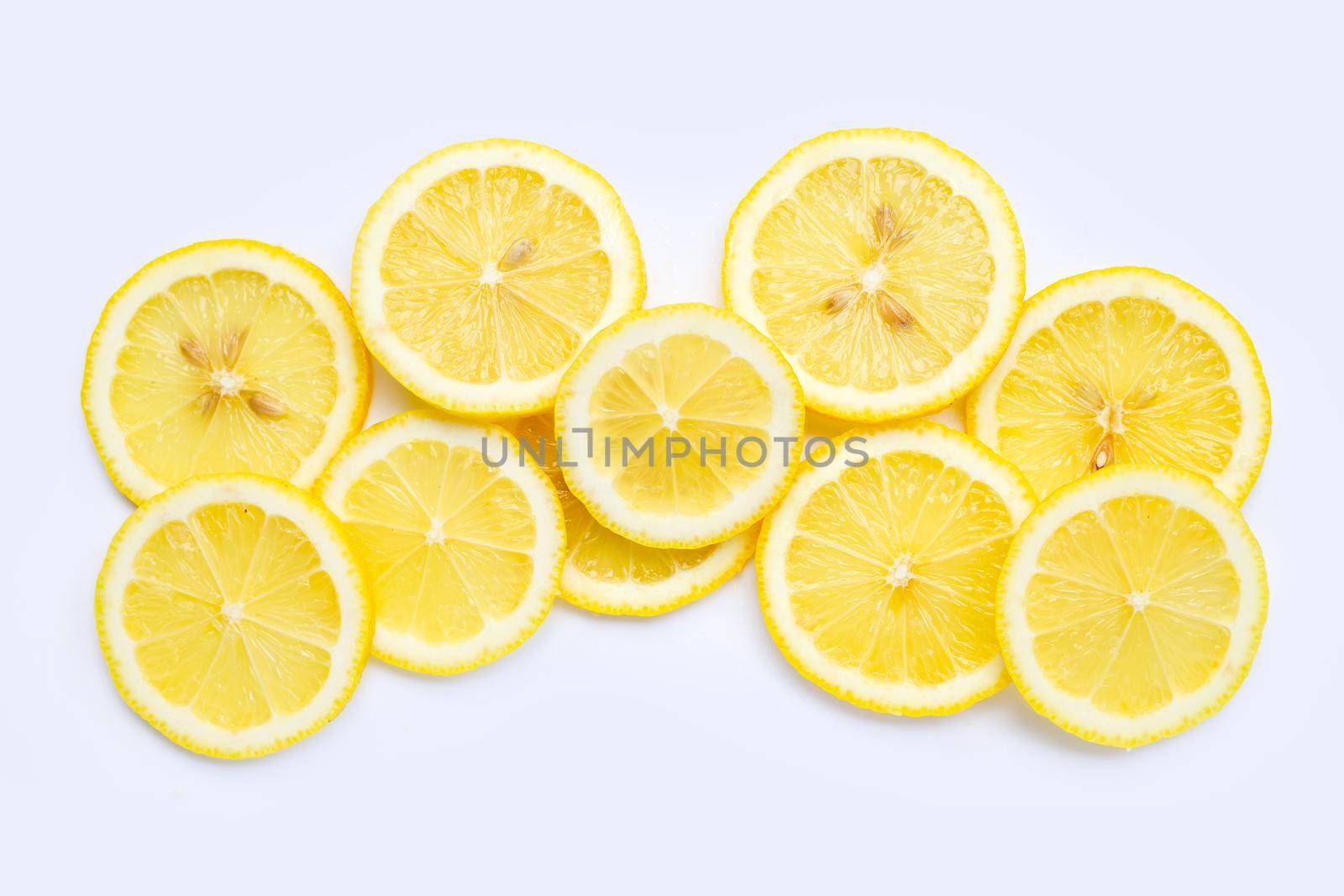 Fresh lemon slices isolated on white background.
