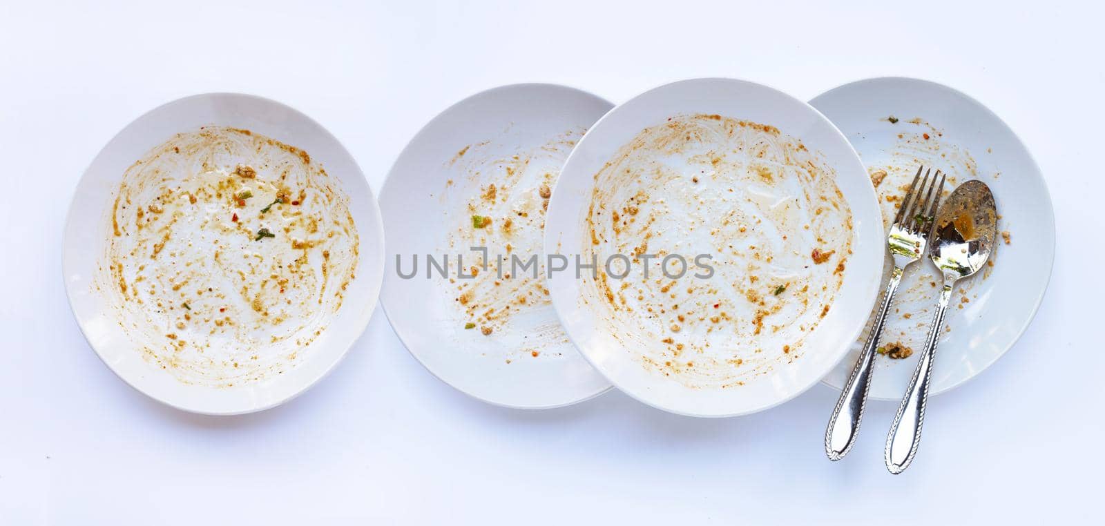 Dirty dish on white background.  by Bowonpat