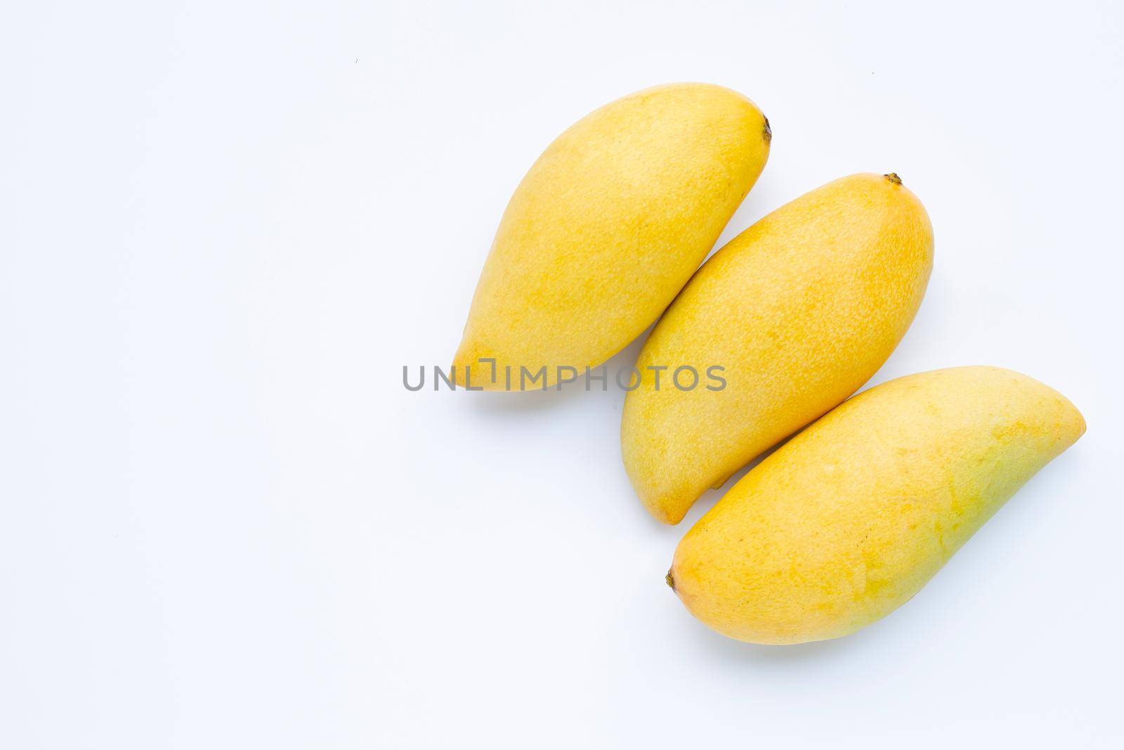 Tropical fruit, Mango  on white background. Top view