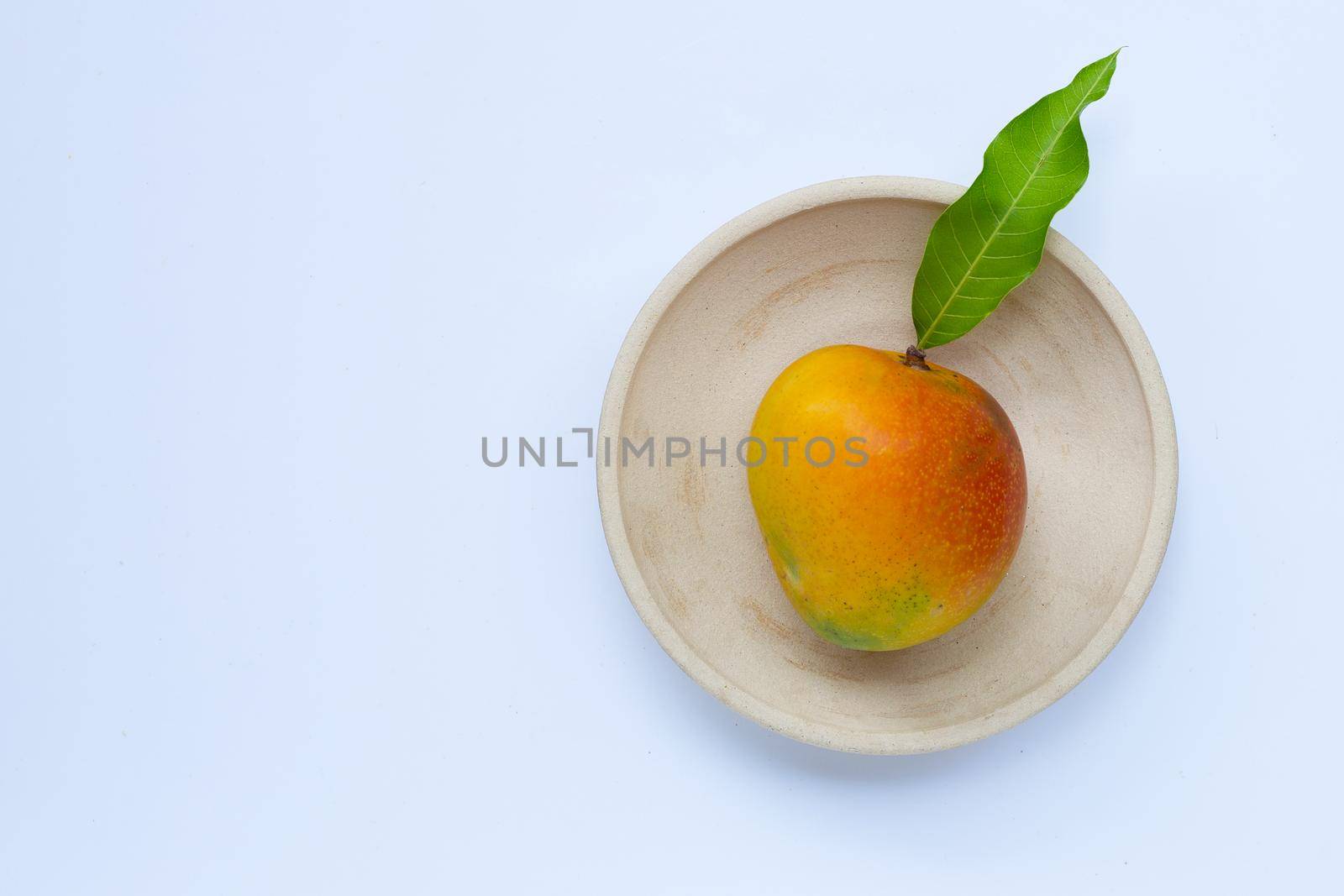 Tropical fruit, Mango  on white background. Top view