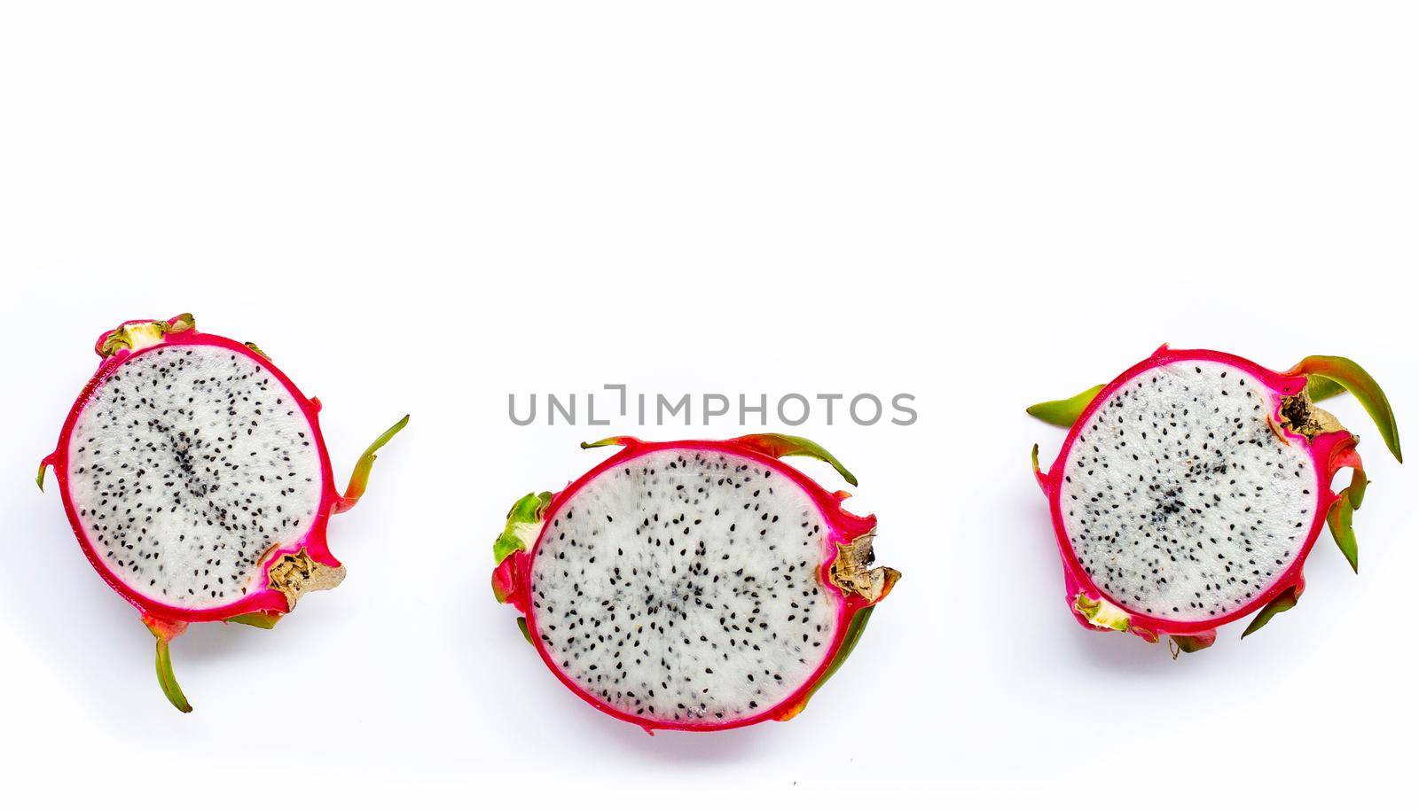 Ripe dragonfruit or pitahaya on wihte background. Top view