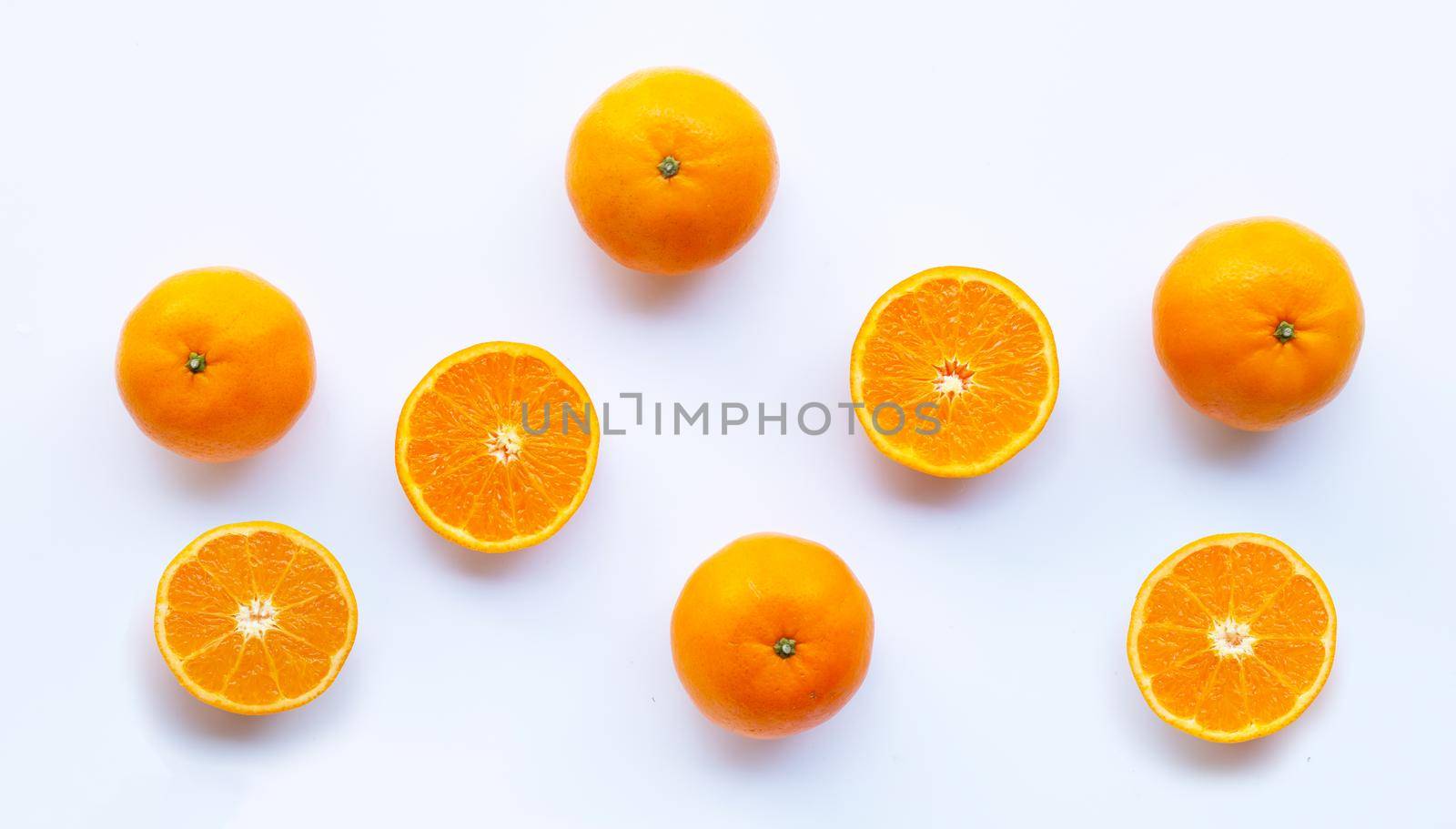 Fresh orange citrus fruit on white background.