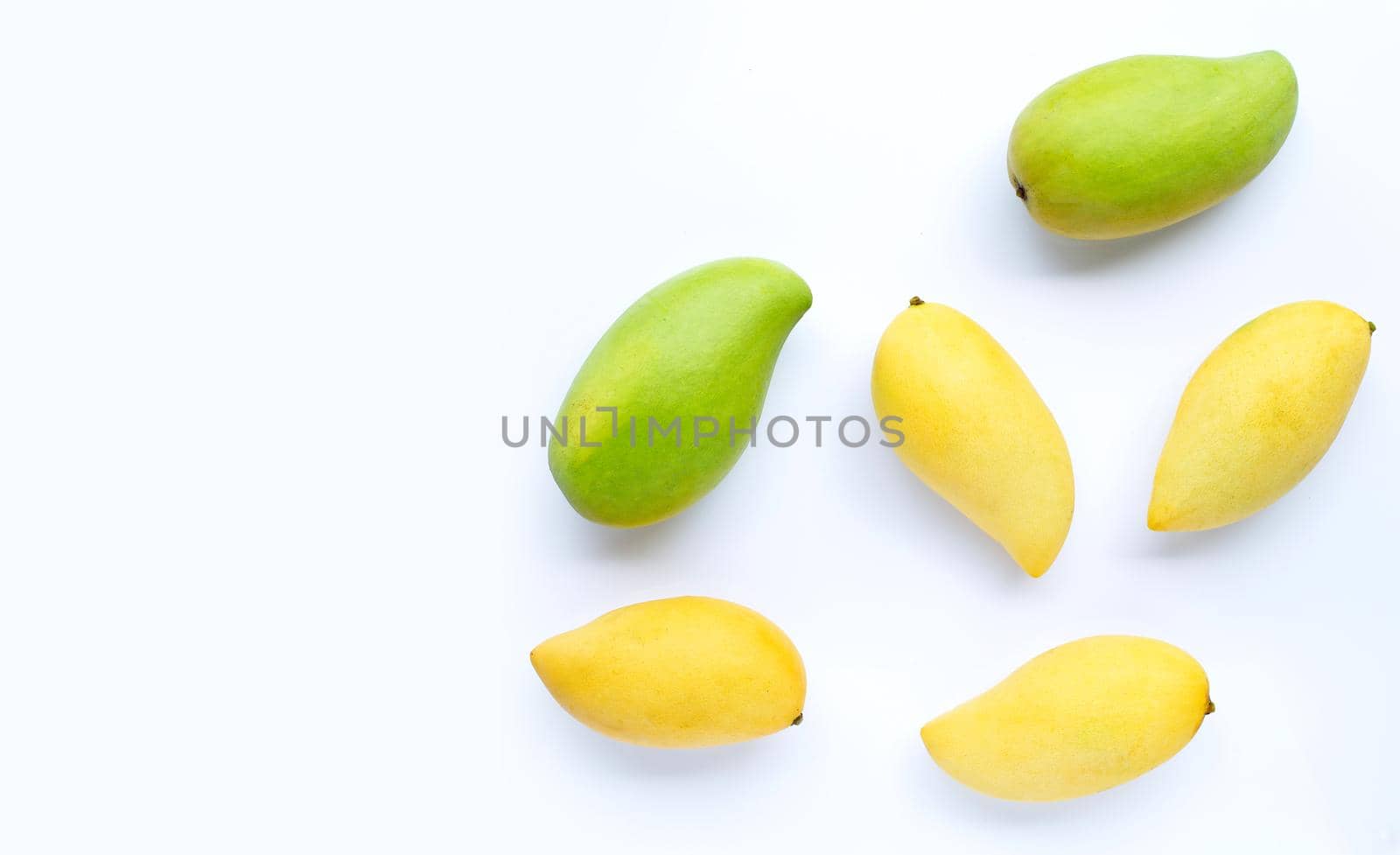 Top view of mango on white background. Copy space