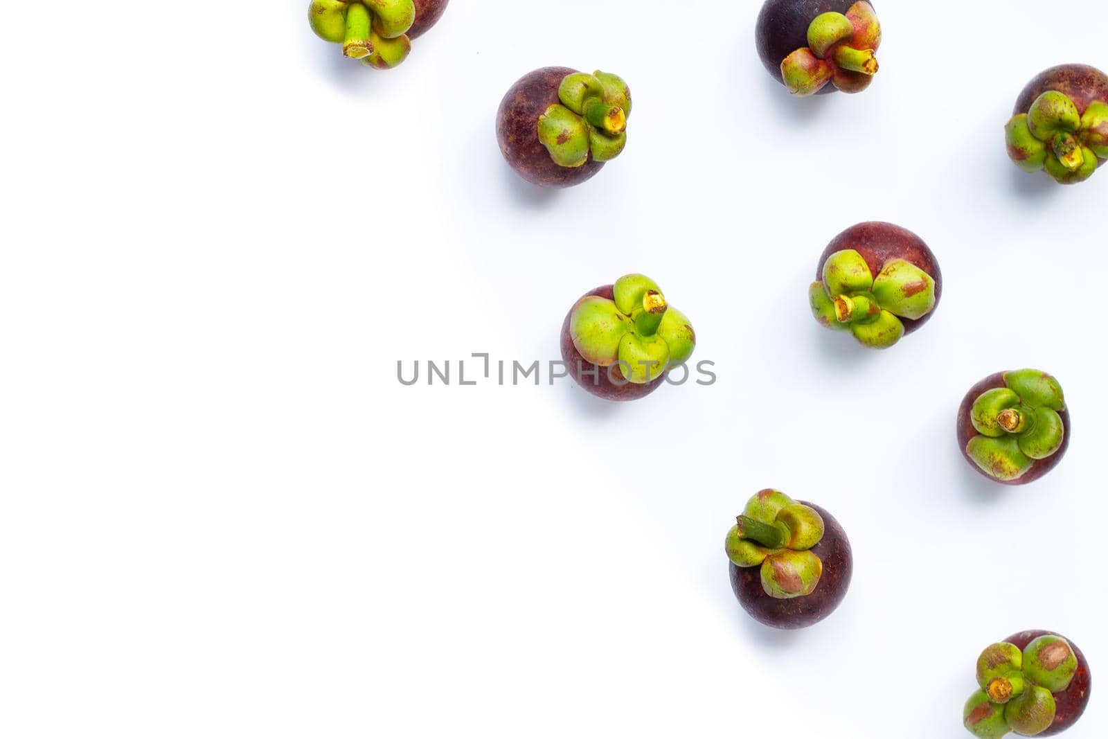 Mangosteen on white background. Top view