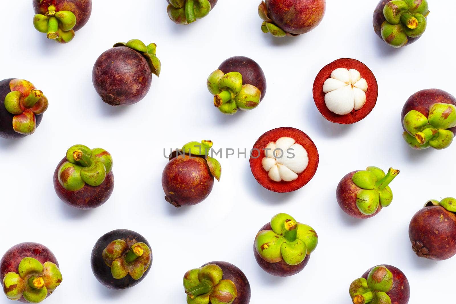 Mangosteen on white background. Top view