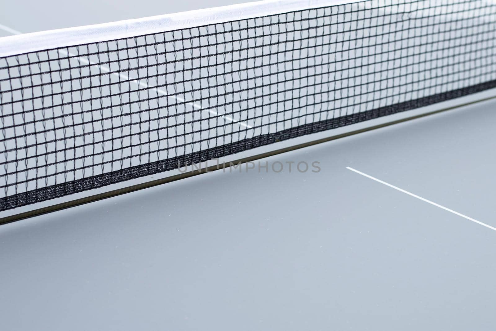 Net of table tennis ping pong on grey background