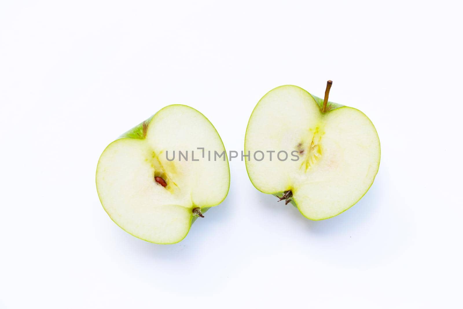 Green apple on white background. Copy space