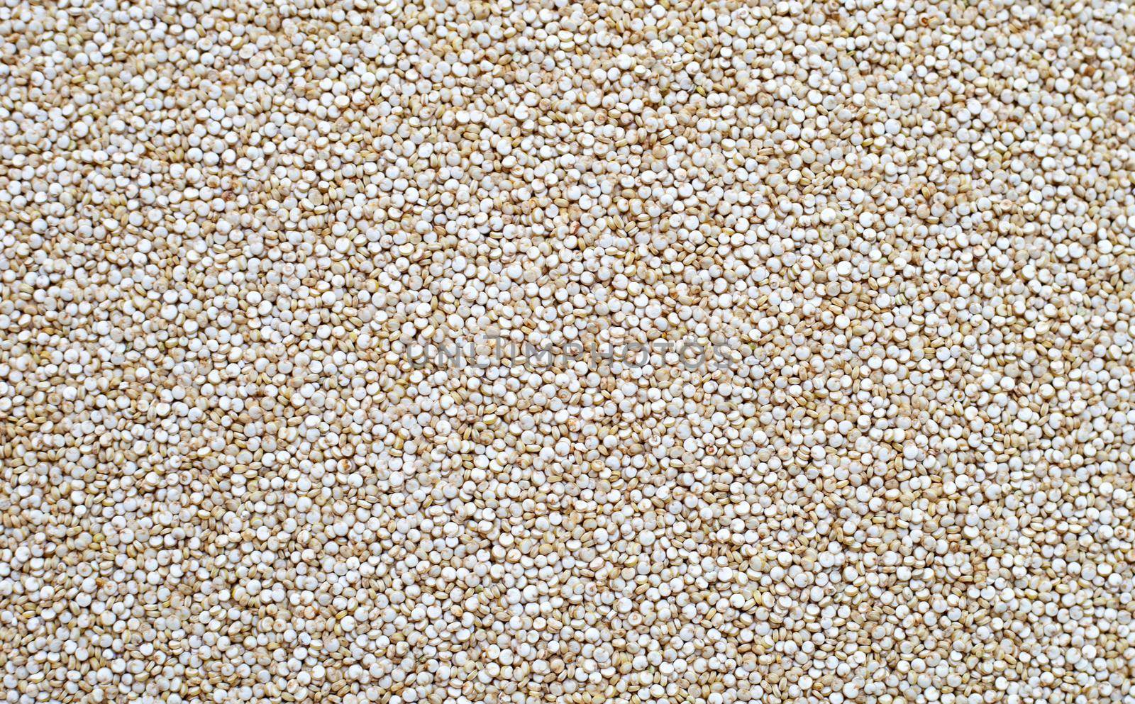 Organic Quinoa seeds background. Top view