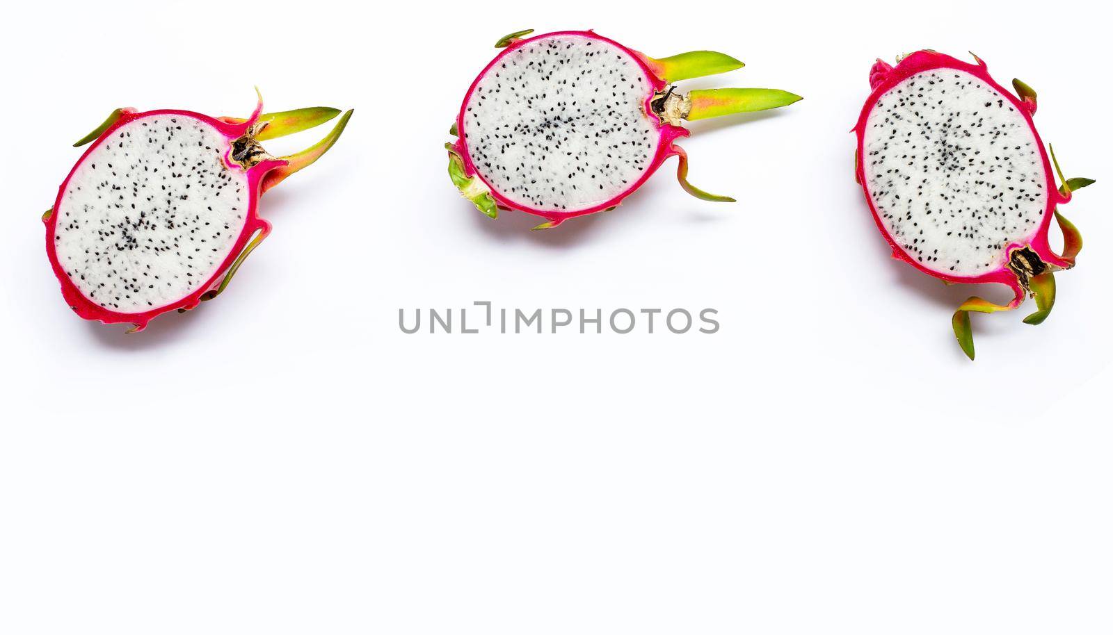 Ripe dragonfruit or pitahaya on wihte background. Top view