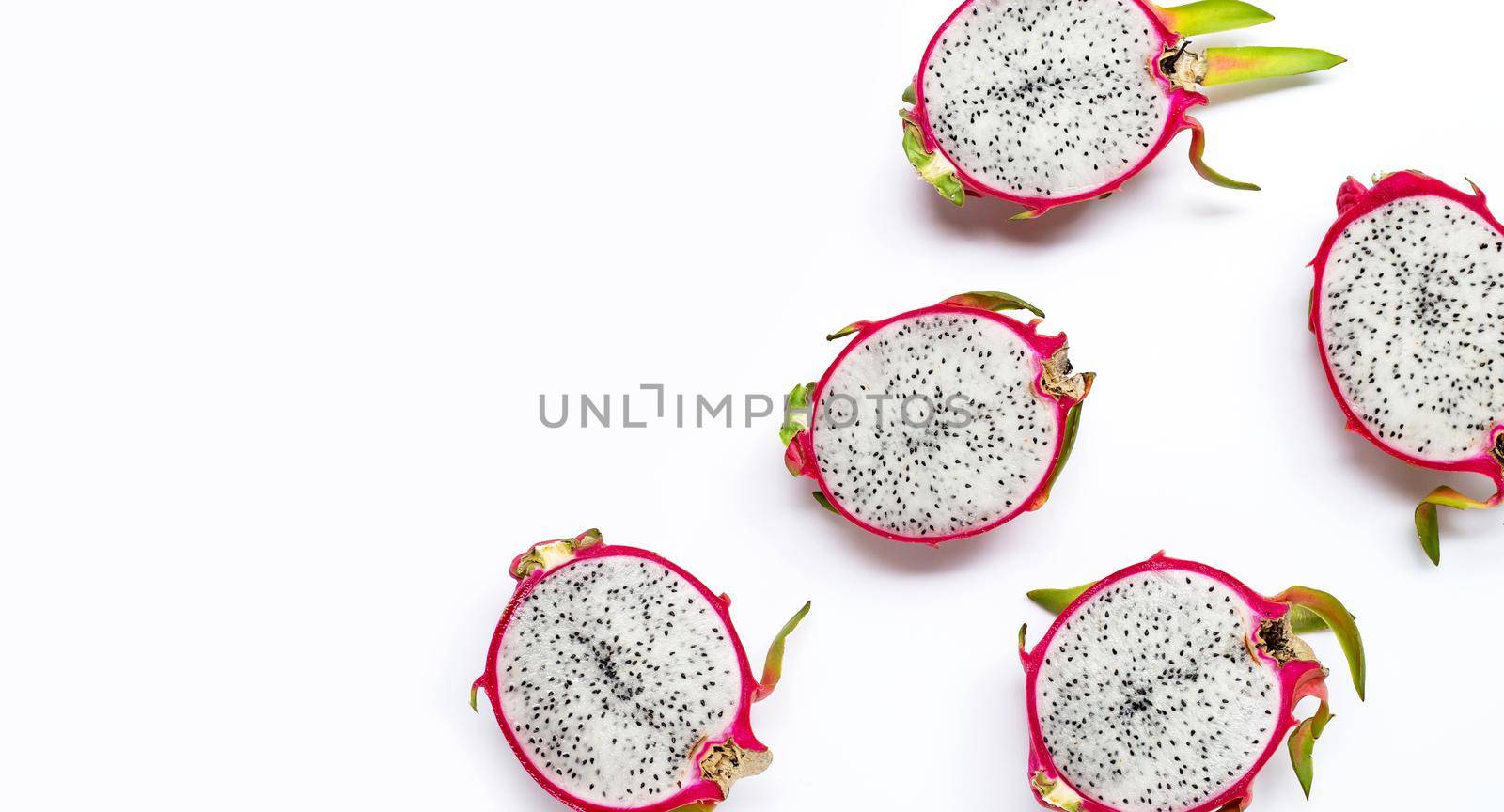 Ripe dragonfruit or pitahaya on wihte background. Top view