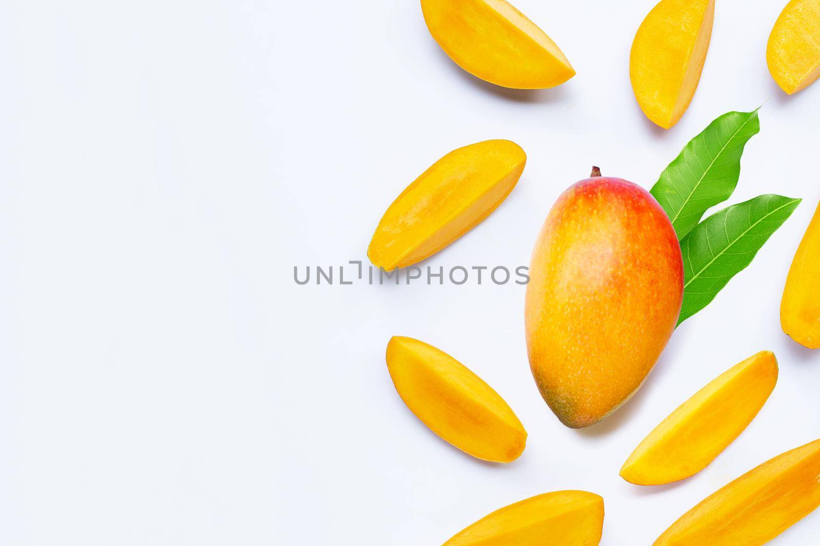 Tropical fruit, Mango  with leaves on white background. Copy space