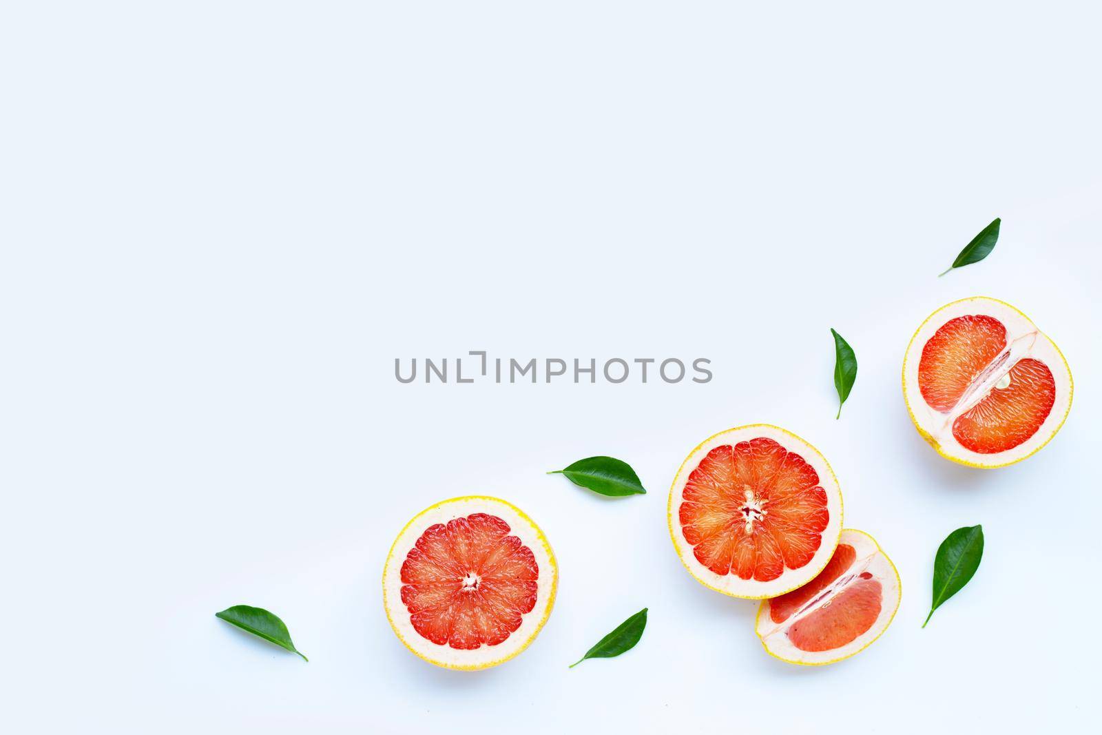 High vitamin C. Juicy grapefruit on white background.