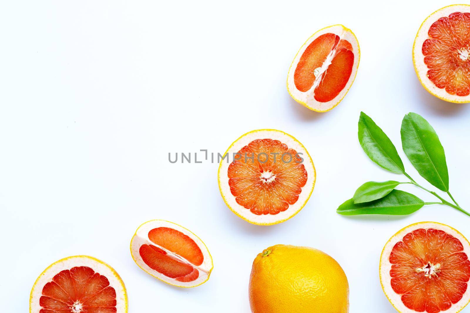 High vitamin C. Juicy grapefruit on white background.